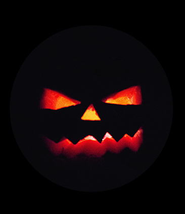 A spooky glowing jack-o-lantern face