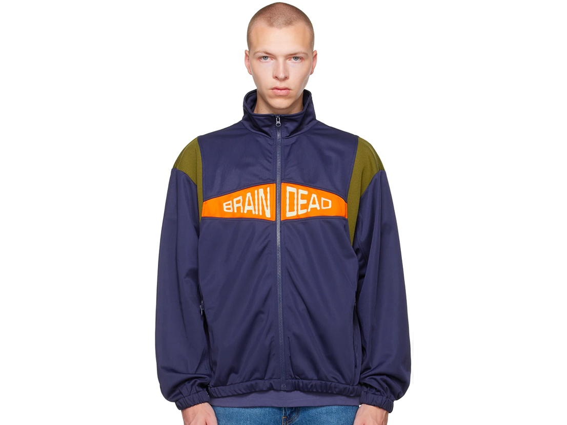 Blue track jacket that reads 'BRAIN DEAD'