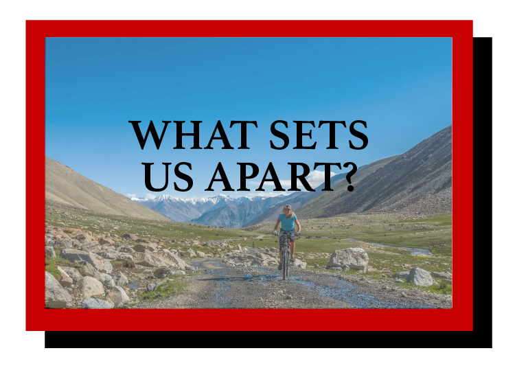 a person riding a bike in the mountains with the words 'What Sets Us Apart'