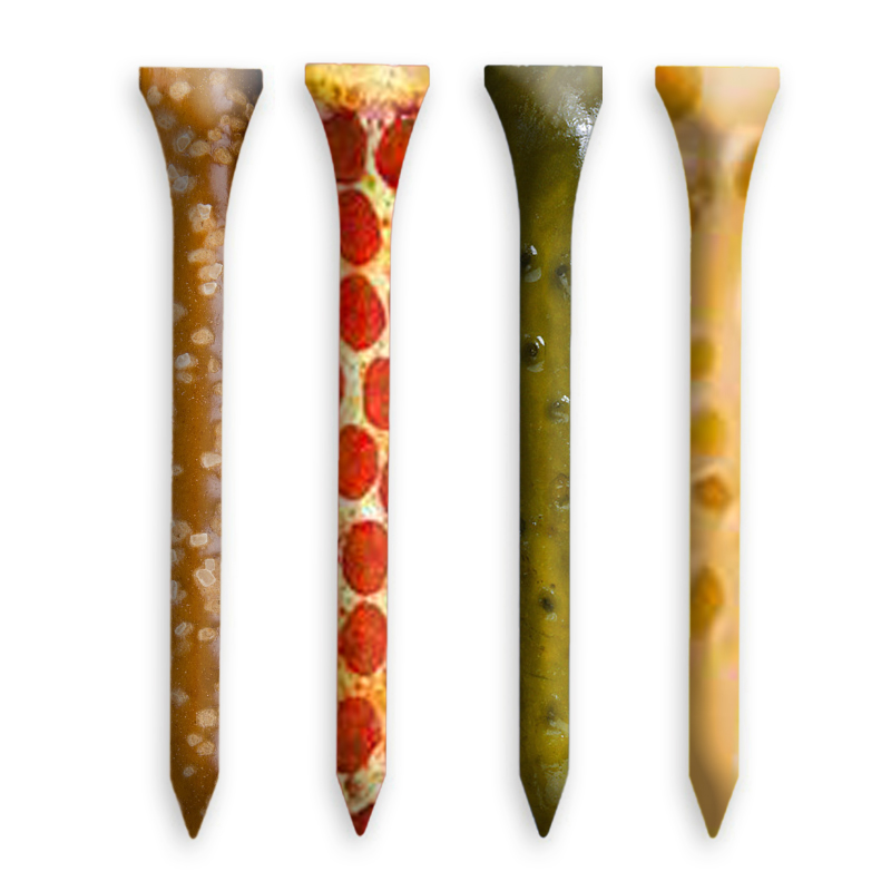 A row of four golf tees, but they do not look like normal golf tees. Each one is edited in Photoshop, overlayed with an image of food. Each one is a different flavor: one pretzel, one pepperoni pizza, one pickle, and one cheese.